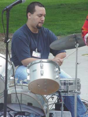 Bob Rodriguez is putting on a show for the Michigan Street audience.